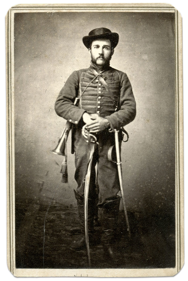 Civil War Union soldiers pictured with bugles and trumpets.