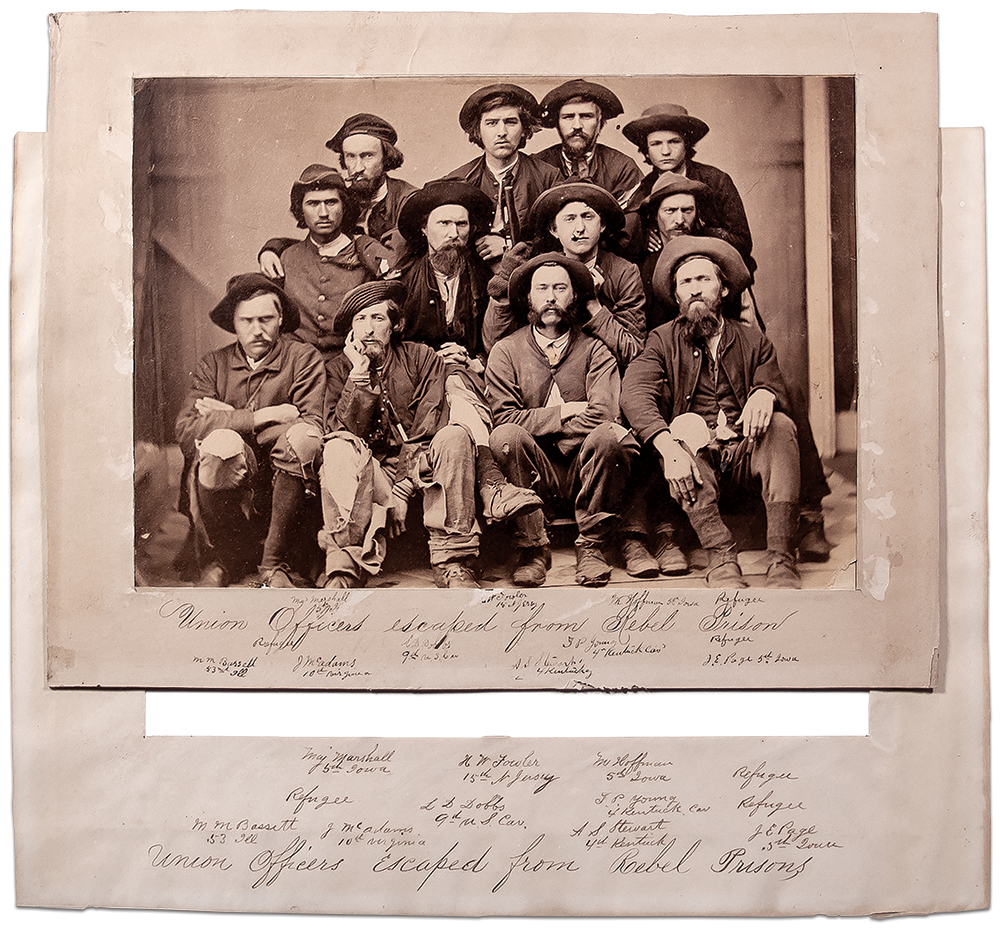 Hoffman family print: This print owned by 1st Lt. Michael Hoffman of the 5th Iowa Infantry correctly identifies the fellow officers who escaped from Camp Sorghum and the Richmond County Jail in Columbia, S.C., between Nov. 10 and 28, 1864, and sat for this portrait in Knoxville on Jan. 2, 1865. The three Southern guides who helped them escape, all Union sympathizers, are identified only as refugees. Subsequent research reveals their names. The ranks of the officers are given at the time on the day they sat for the photograph. Original albumen print attributed to Theodore M. Schleier of Knoxville, Tenn. Courtesy of the Charles Hoffman Family.