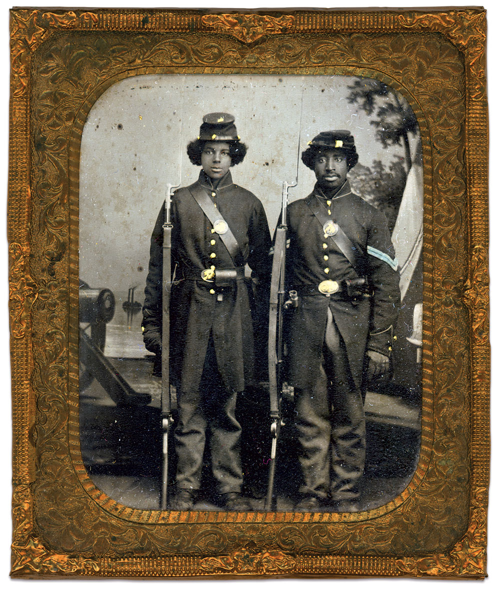 An unidentified corporal and private at Benton Barracks, circa 1864. Sixth-plate tintype by Enoch Long of St. Louis, Mo. Claudia and Al Niemiec Collection.